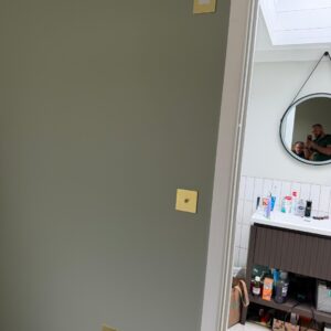 Brushed brass toggle light switch installation by APM Electrical Bromley